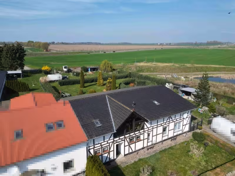 Zweifamilienwohnhaus mit Nebengebäude in Altefähr - Bild 2