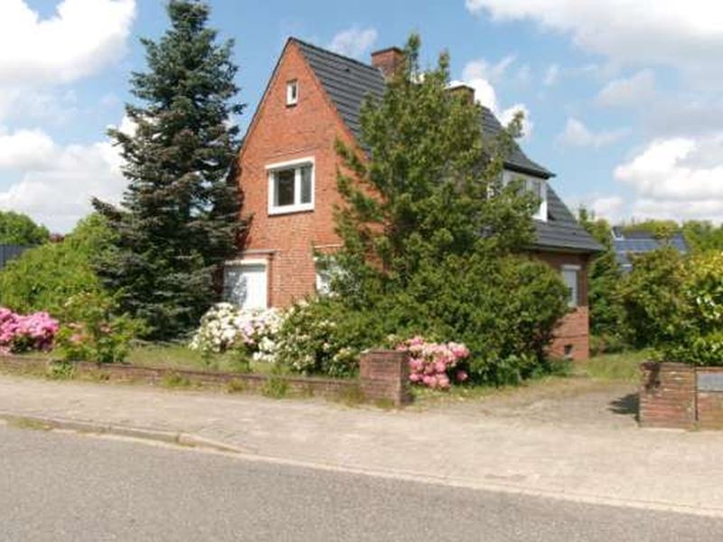 Einfamilienhaus mit Einliegerwohnung in Fockbek - Bild 1