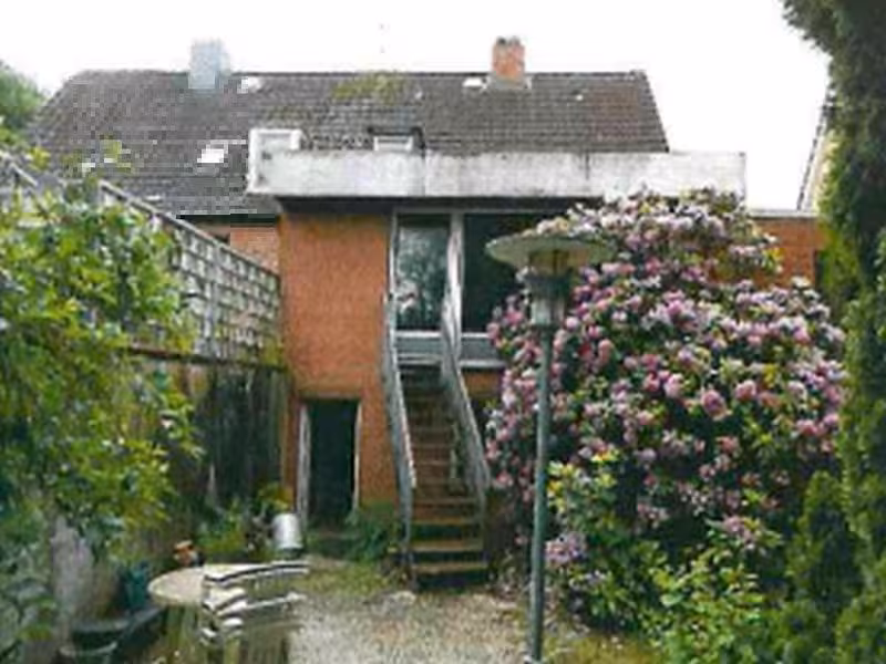 Doppelhaushälfte mit Anbau und Einzelgarage in Kiel - Bild 1