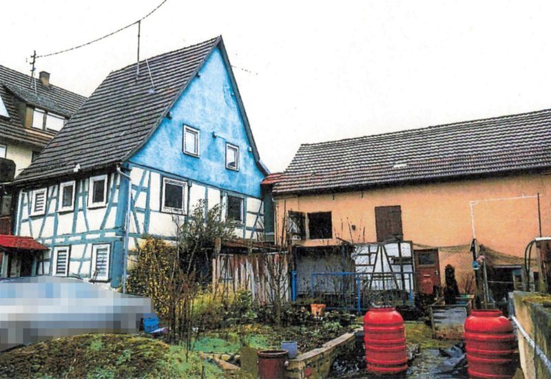 Einfamilienhaus nebst Scheunengebäude mit 2 Garagen und Gartengrundstück in Olnhausen - Bild 1