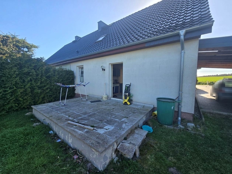Einfamilienwohnhaus (Doppelhaushälfte) mit Nebengebäuden in Groß Teetzleben - Bild 2