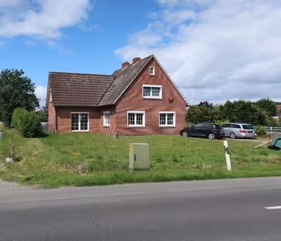 Einfamilienhaus in Tichelwarfer Straße 31, 26826 Weener, Holthusen - Bild 1