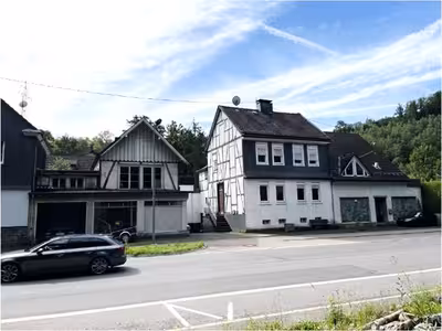 unbebautes Grundstück, gewerblich genutztes Grundstück, Wohn-/Geschäftshaus, Einfamilienhaus, Werkstatt- und Lagergebäude in Eckenhagener Straße 44, 51645 Gummersbach, Derschlag - Bild 1