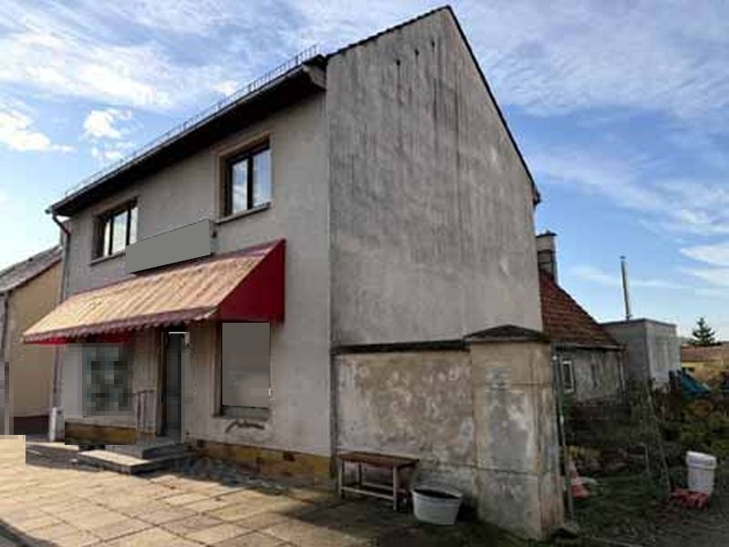 Geschäftshaus mit Nebengebäuden in Friesack - Bild 1