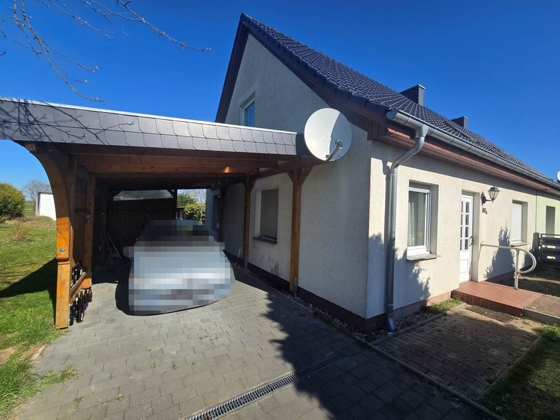 Einfamilienwohnhaus (Doppelhaushälfte) mit Nebengebäuden in Groß Teetzleben - Bild 1