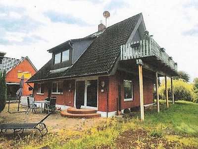 Einfamilienhaus mit Einliegerwohnung und Garage in Neue Straße 27, 23847 Westerau - Bild 1