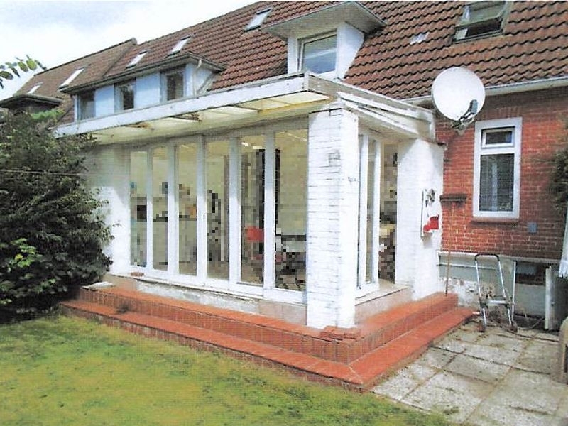 Reihenendhaus mit Garagengebäude und Holzschuppen in Niebüll - Bild 3