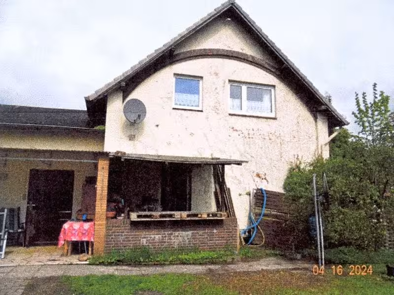 Einfamilienhaus mit Anbau in Holm - Bild 1