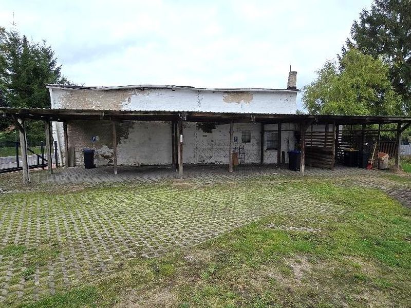 Mehrfamilienhaus mit Nebengebäuden in Laage - Bild 4