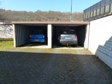 mit einer Metalldoppelgarage bebautes Grundstück in Laubach 4, 56068 Koblenz - Bild 1