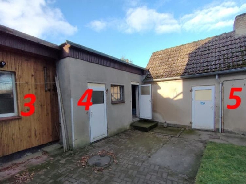 Mit einem Teil des Wohnhauses mit Nebengelasses bebautes Grundstück in Tribsees - Bild 1