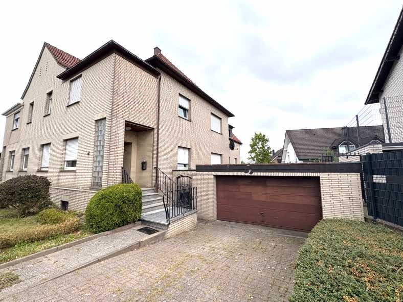 Zweifamilienhaus, Garage, Doppelhaushälfte in Löhne - Bild 1