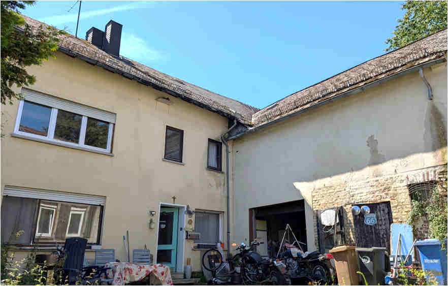 Grundstück bebaut mit einem Wohnhaus mit Scheune, Grundstück mit Nebengebäude in Mengerskirchen - Bild 1