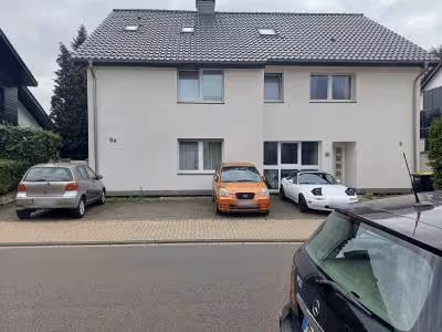 unbebautes Grundstück, Garage, zweigeschossiges Wohnhaus, unbebaute Splitterfäche in Ratingen - Bild 1