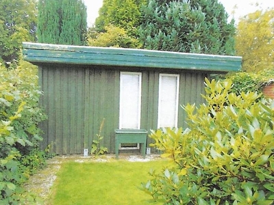 Reihenendhaus mit Garagengebäude und Holzschuppen in Hungerfennenweg 29, 25899 Niebüll - Bild 1