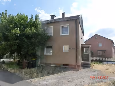Einfamilienhaus, Doppelhaushälfte in Am Mühlenweg 1, 53842 Troisdorf, West - Bild 1