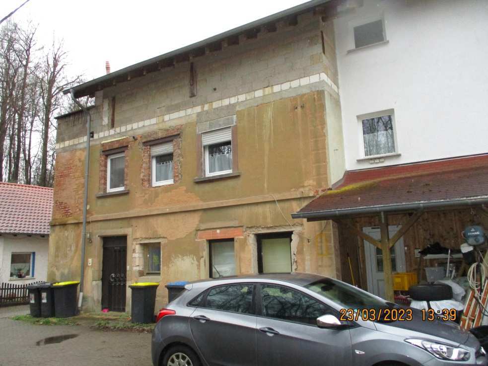 Freistehendes Mehrfamilienhaus mit vier Wohnungen, dazu ein Zimmer   im Dachgeschoss, einseitig Grenzbebauung, gegliedert in 1. und 2. UG, EG, OG und DG. in Friedrichsthal - Bild 4