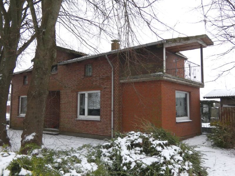 Resthof mit Wohn- und Wirtschaftstrakt in Schülp - Bild 1