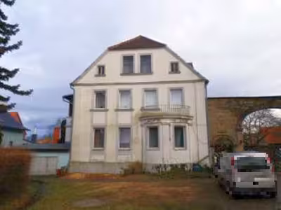 Mehrfamilienhaus mit mehreren ehem. Wirtschaftsgebäuden in Ernst-Thälmann-Platz 4, 39164 Bottmersdorf - Bild 1