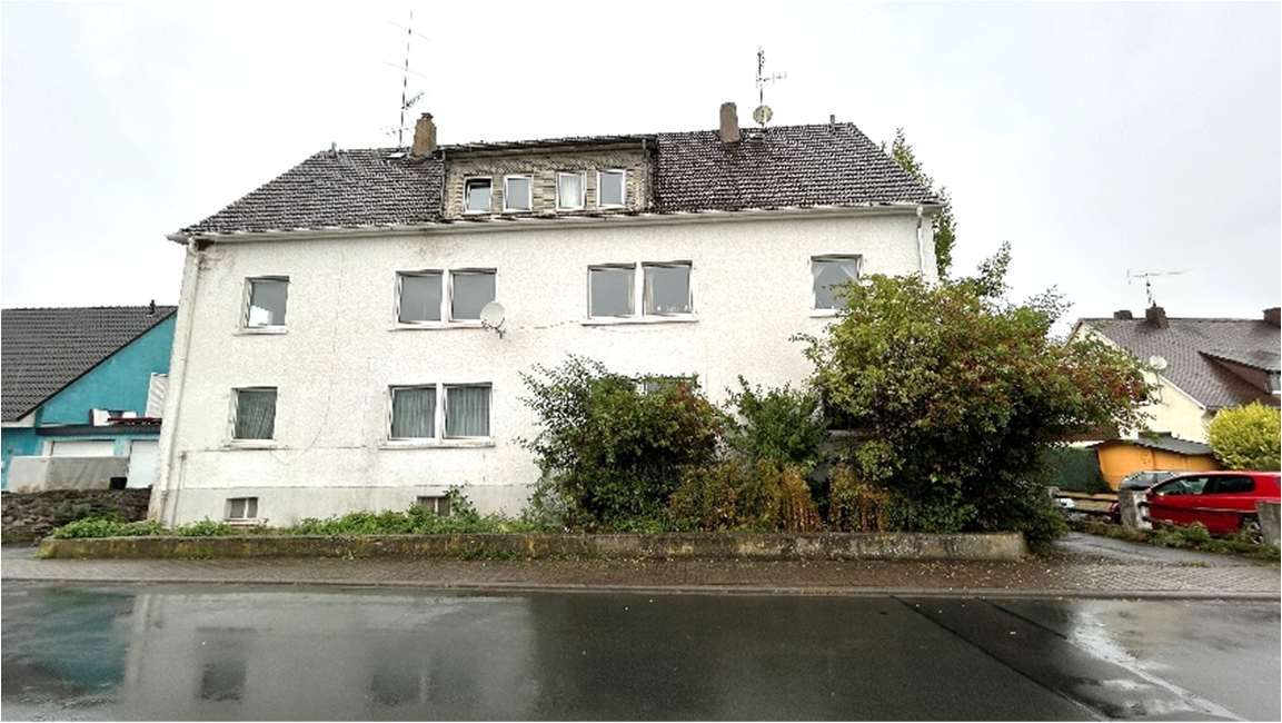 Mehrfamilienhaus in Lohrheim - Bild 1