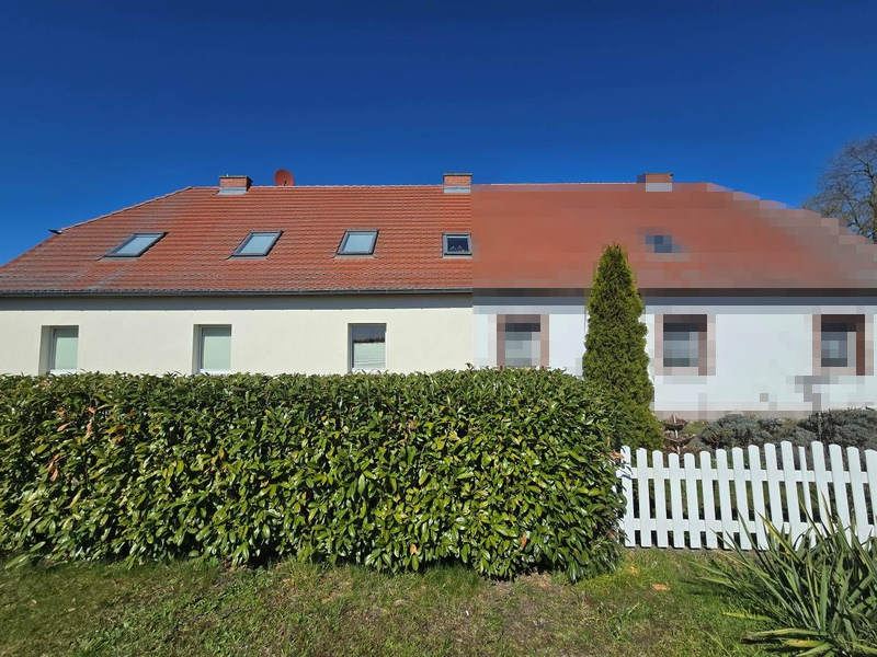 Einfamilienwohnhaus (Doppelhaushälfte) mit Doppelcarport in Demmin - Bild 1