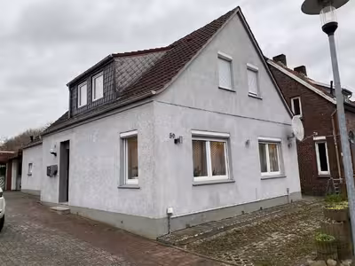 Wohnhaus mit massivem Nebengebäude (Garage) in Mühlenstraße 59, 26409 Wittmund - Bild 1