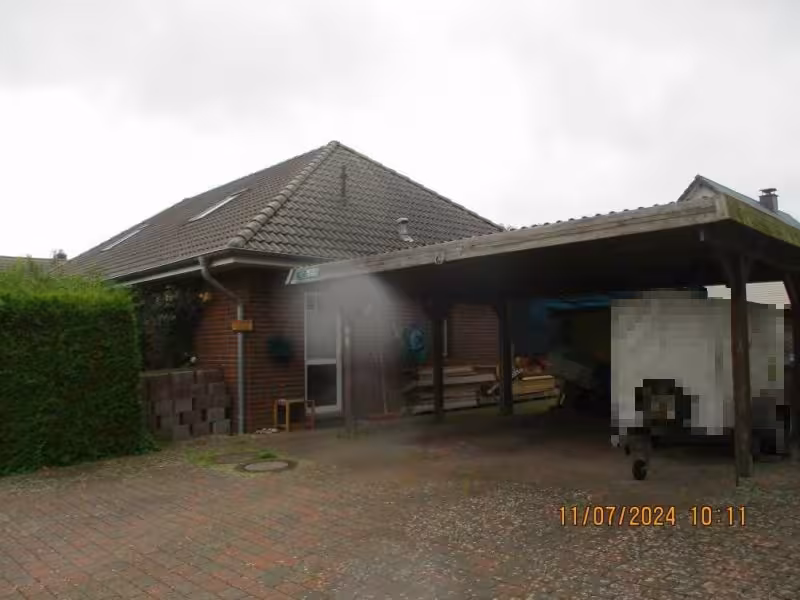 Einfamilienhaus mit Doppelcarport und 2 Gartenhäusern in Silberstedt - Bild 1