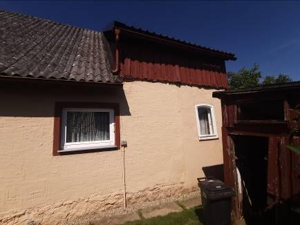 Einfamilienhaus mit Anbau und Holzgarage in Nagel - Bild 4