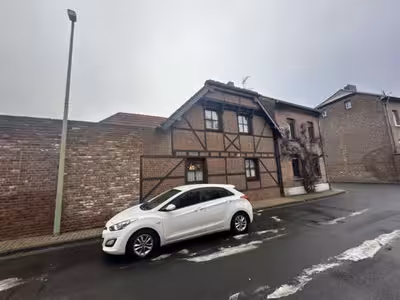 Einfamilienhaus, diverse Nebengebäude, ehemalige Stallungen in Ginnstraße 21, 52445 Titz - Bild 1