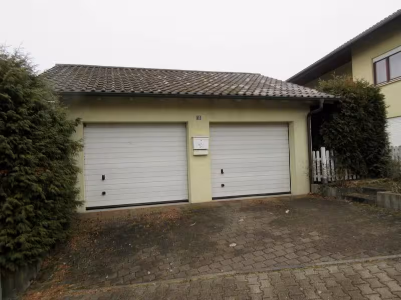 Einfamilienwohnhaus mit Garage, Doppelgarage und Freizeitgarten in Sinsheim - Bild 4