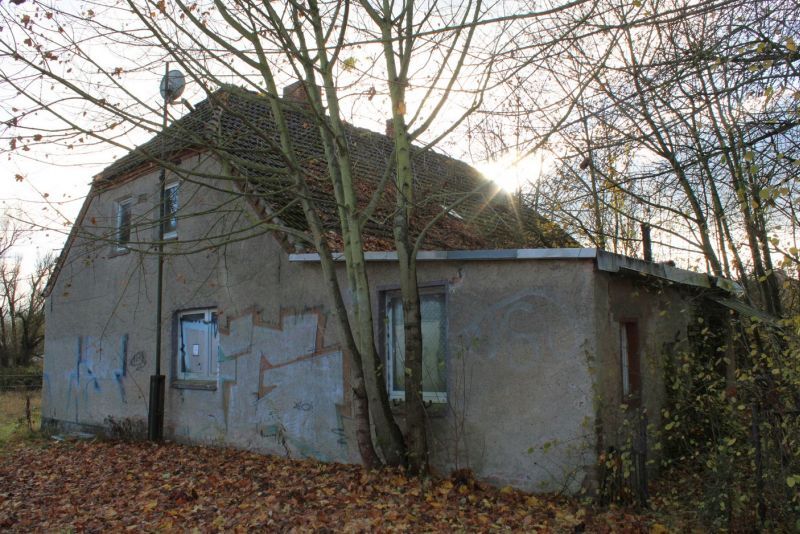 Wohnhaus mit Nebengebäuden und unbebaute Grundstücke in Neubrandenburg - Bild 1