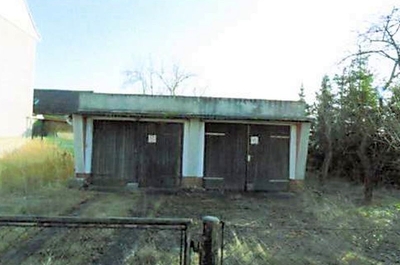 Mehrfamilienhaus mit Nebengebäuden und Doppelgarage in Torgauer Straße 58, 04938 Uebigau-Wahrenbrück OT Uebigau - Bild 1