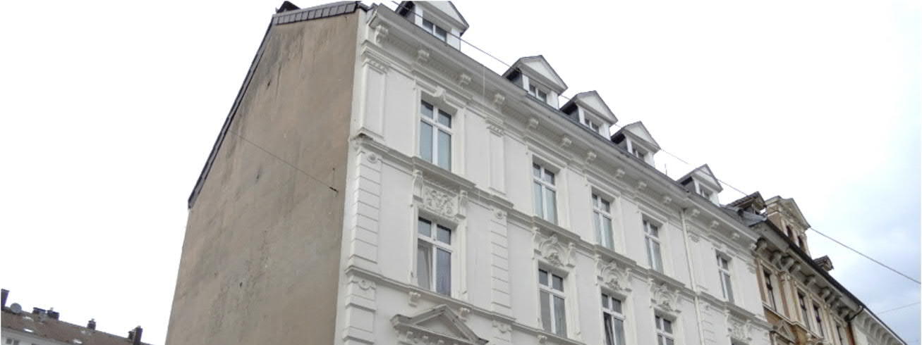 Wohn- und Geschäftshaus und einem gewerblich genutzten Hinterhaus bebauten Grundstücks in Wuppertal - Bild 1