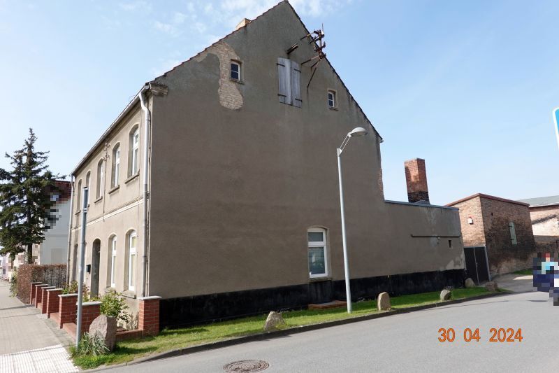 Einfamilienhaus mit Nebengebäuden in Stavenhagen - Bild 1