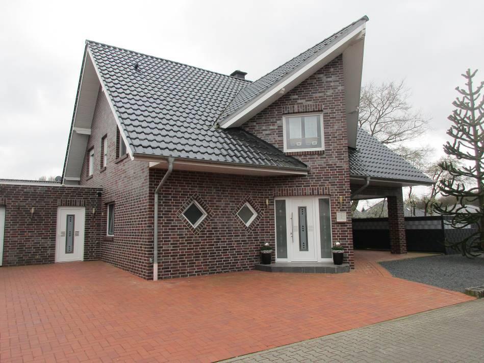 Wohn-/Geschäftshaus, Einfamilienhaus mit Nebengebäuden in Werlte - Bild 1
