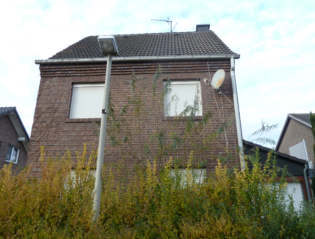 Einfamilienhaus, Baugrundstück, 2 Garagen auf dem Grundstück in Am Mühlenweg 5, 41836 Hückelhoven, Ratheim - Bild 2