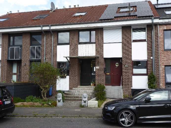 Reihenmittelhaus mit Garage und Miteigentumsanteil an einer Erschließungsfläche in Willich - Bild 1