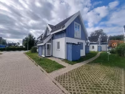 Wohnungseigentum (Doppelhaushälfte als Ferienhaus) in Bernsteinpark 3, 18556 Breege - Bild 1