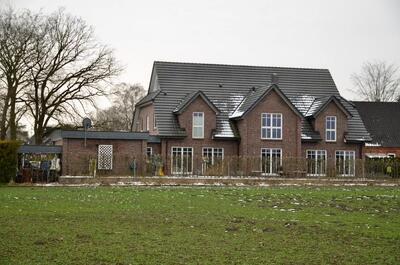 Einfamilienhaus in Neukruger Straße 7, 28816 Stuhr, Heiligenrode - Bild 1