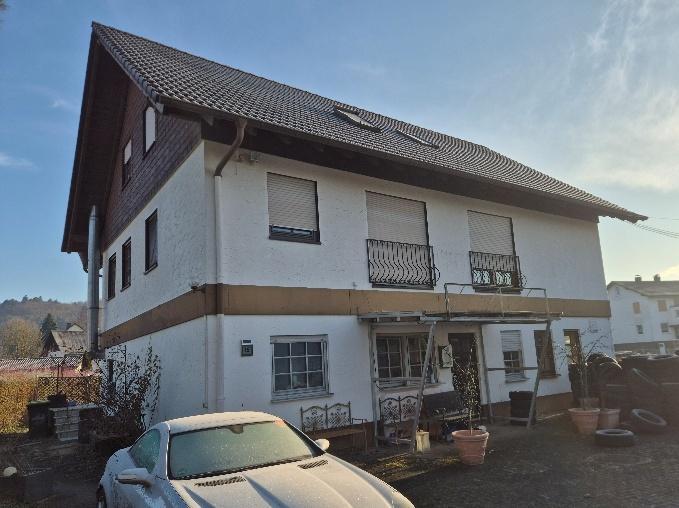 Wohn-/Geschäftshaus in Eckelshausen - Bild 1