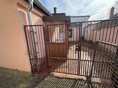 Einfamilienhaus (Doppelhaushälfte) mit 2 Garagen in Lange Straße 27, 17089 Siedenbollentin - Bild 1