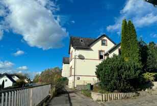 unbebautes Grundstück, Garage, Einfamilienhaus in Detmold - Bild 1