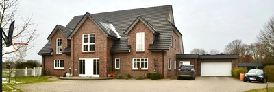Einfamilienhaus in Neukruger Straße 7, 28816 Stuhr, Heiligenrode - Bild 1