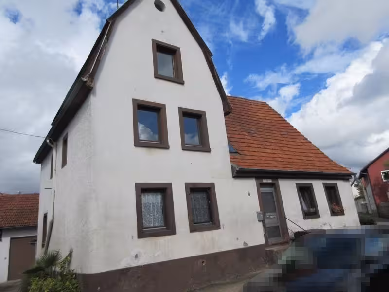 Mehrfamilienwohnhäuser,  Nebengebäude, Betriebsgebäude u.a. in Wiesloch - Bild 1