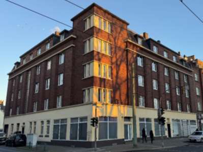 Wohn-/Geschäftshaus, mit Anbau und Garagen in Duisburg - Bild 1