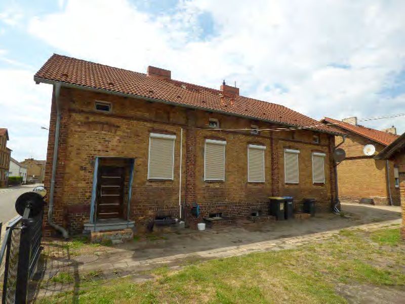 Wohnhaus (2 Doppelhaushälften) mit Nebengebäude in Schipkau - Bild 1