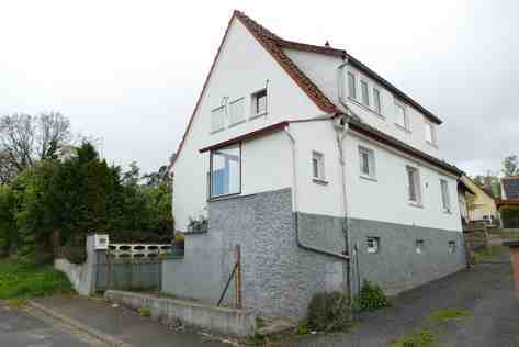 Einfamilienhaus, unbebautes Grundstück in Romrod - Bild 1