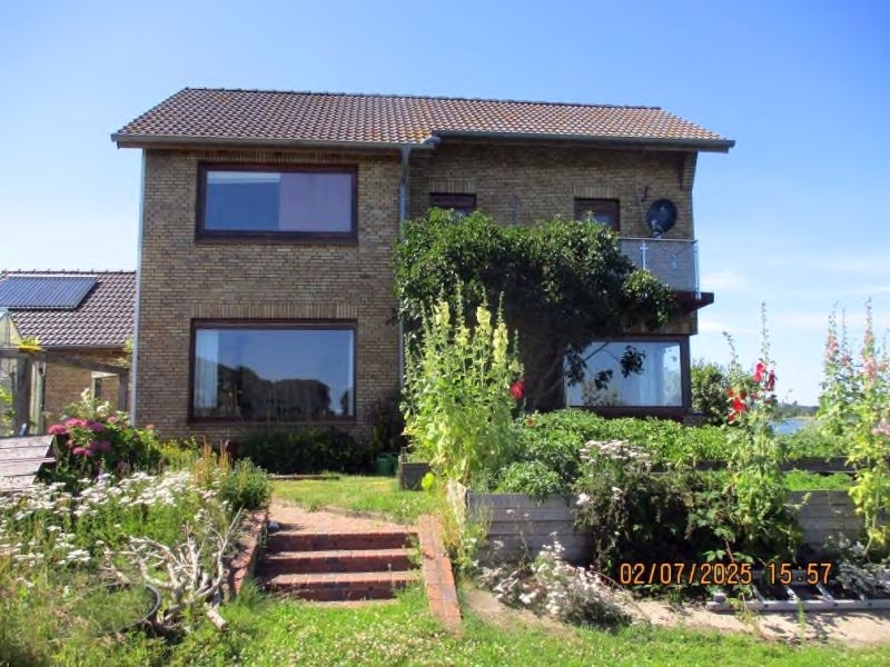 Einfamilienhaus mit Garage und Carport in Arnis - Bild 1