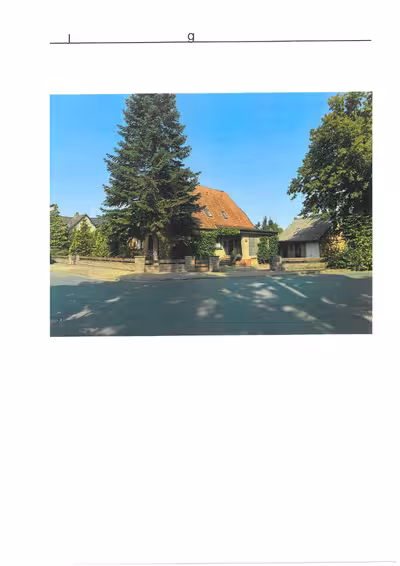 Wohnhaus mit zwei Wohneinheiten sowie einem Garagen- und Lagergebäude in Sandstraße 21, 38550 Isenbüttel - Bild 1