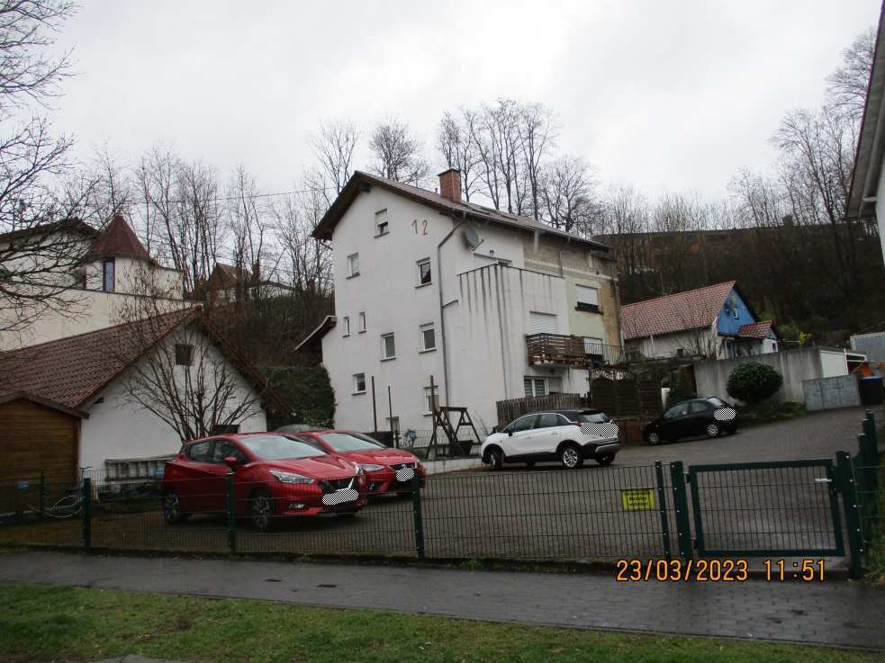 Freistehendes Mehrfamilienhaus mit vier Wohnungen, dazu ein Zimmer   im Dachgeschoss, einseitig Grenzbebauung, gegliedert in 1. und 2. UG, EG, OG und DG. in Friedrichsthal - Bild 2